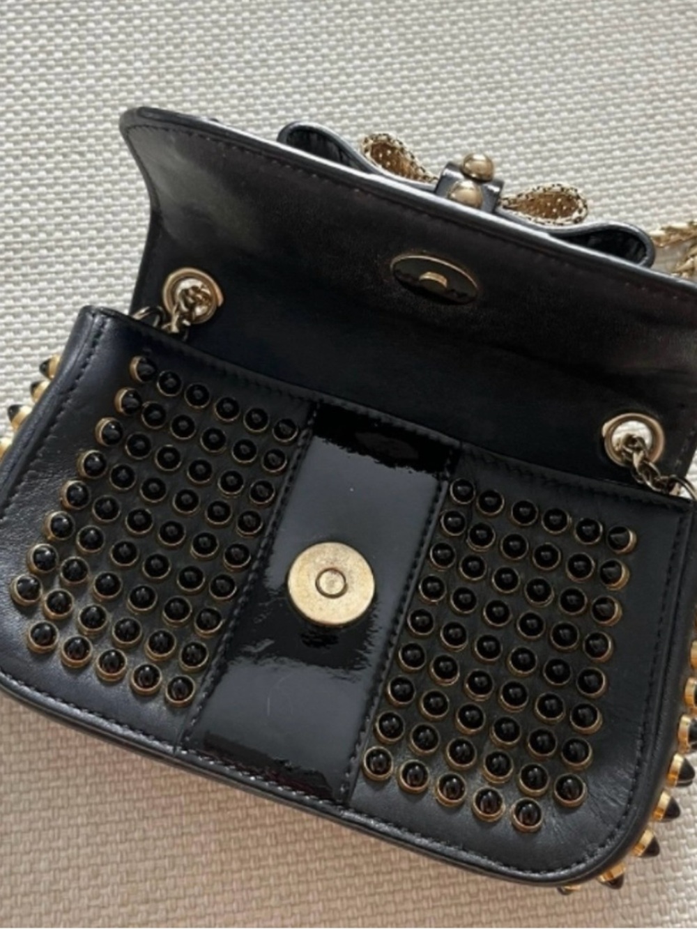 Authentic Christian Louboutin Black Studded Bow Crossbody Bag with Gold Accents - Picture 3 of 6